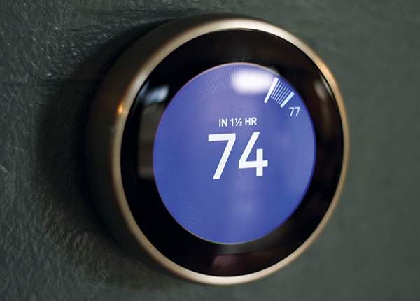 smart thermostat displaying 74 degrees