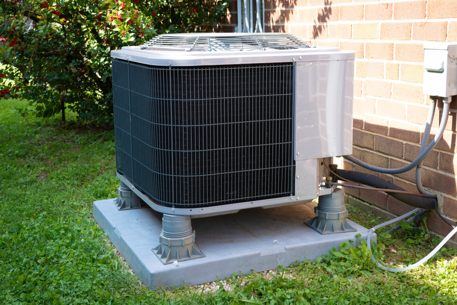 Air conditioning condenser outside home