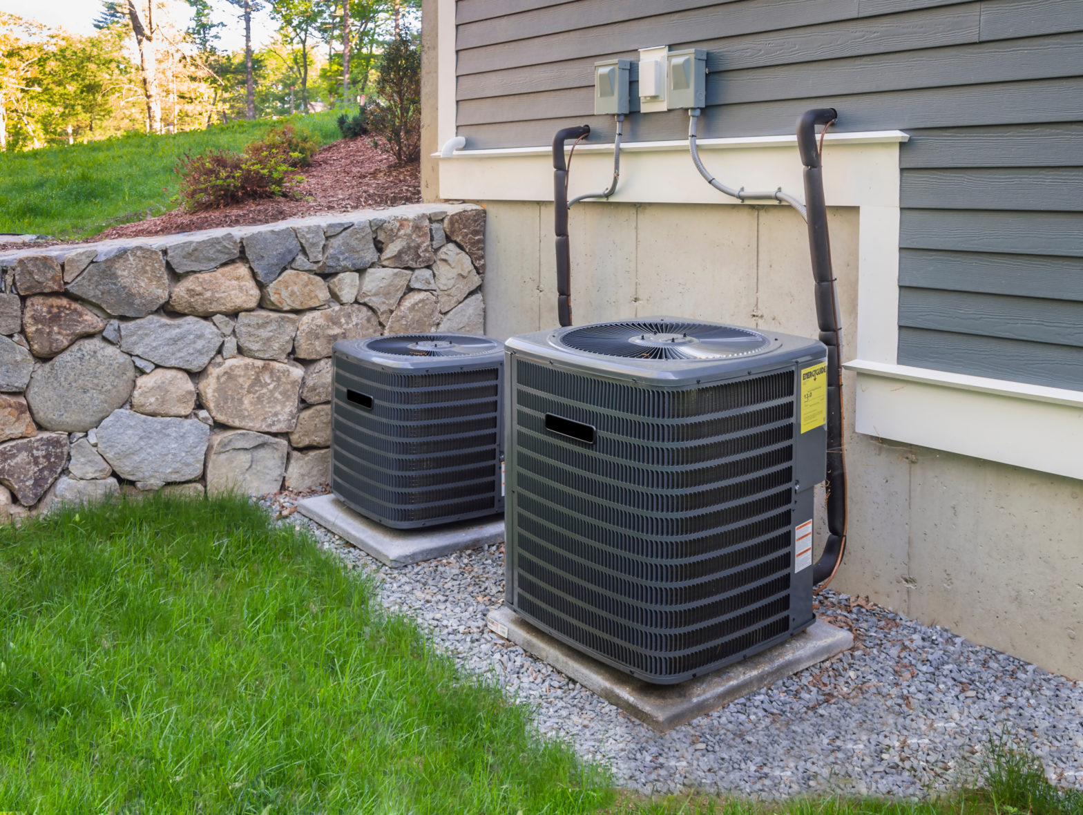 Air conditioner condensers outside home